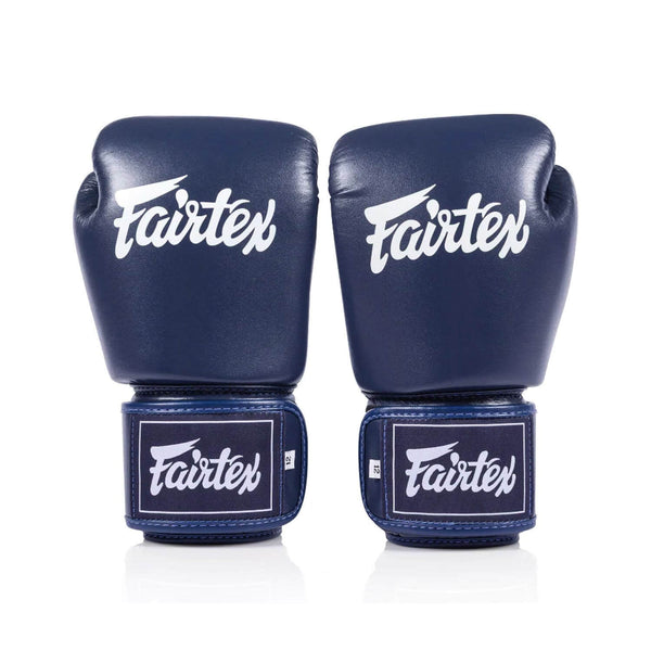 Front view of navy blue Fairtex BGV1C PLUS Microfibre boxing gloves on a white background