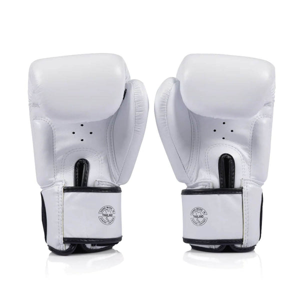 Pair of white Fairtex bgv1c plus boxing gloves with black accents on a white background