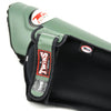 Close-up of a green and black protective pad Twins Special Leather Shinguards SGL10