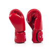 Red fairtex bgv1c plus boxing gloveson a white background side view